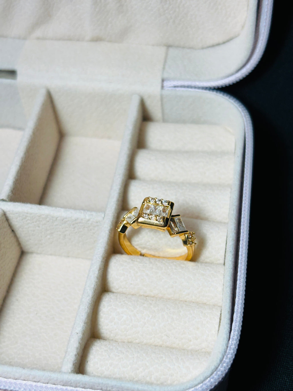 Gold colour square and oval shaped ring