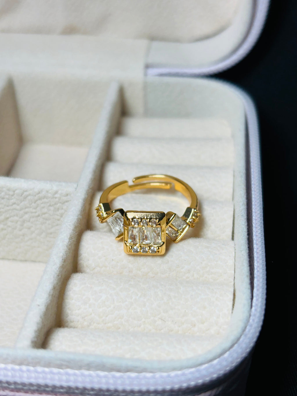 Gold colour square and oval shaped ring