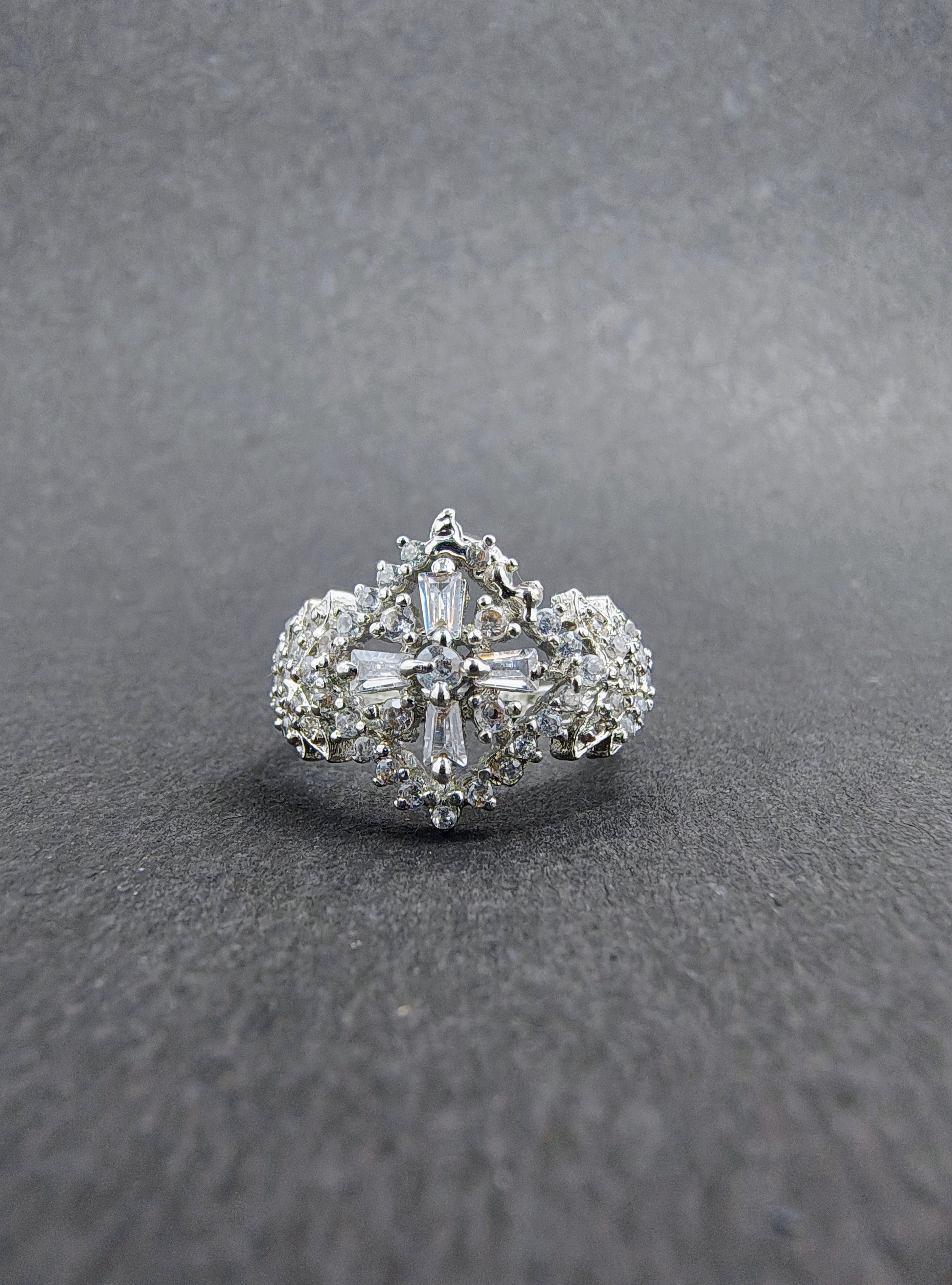 Silver snowflake ring with white stones