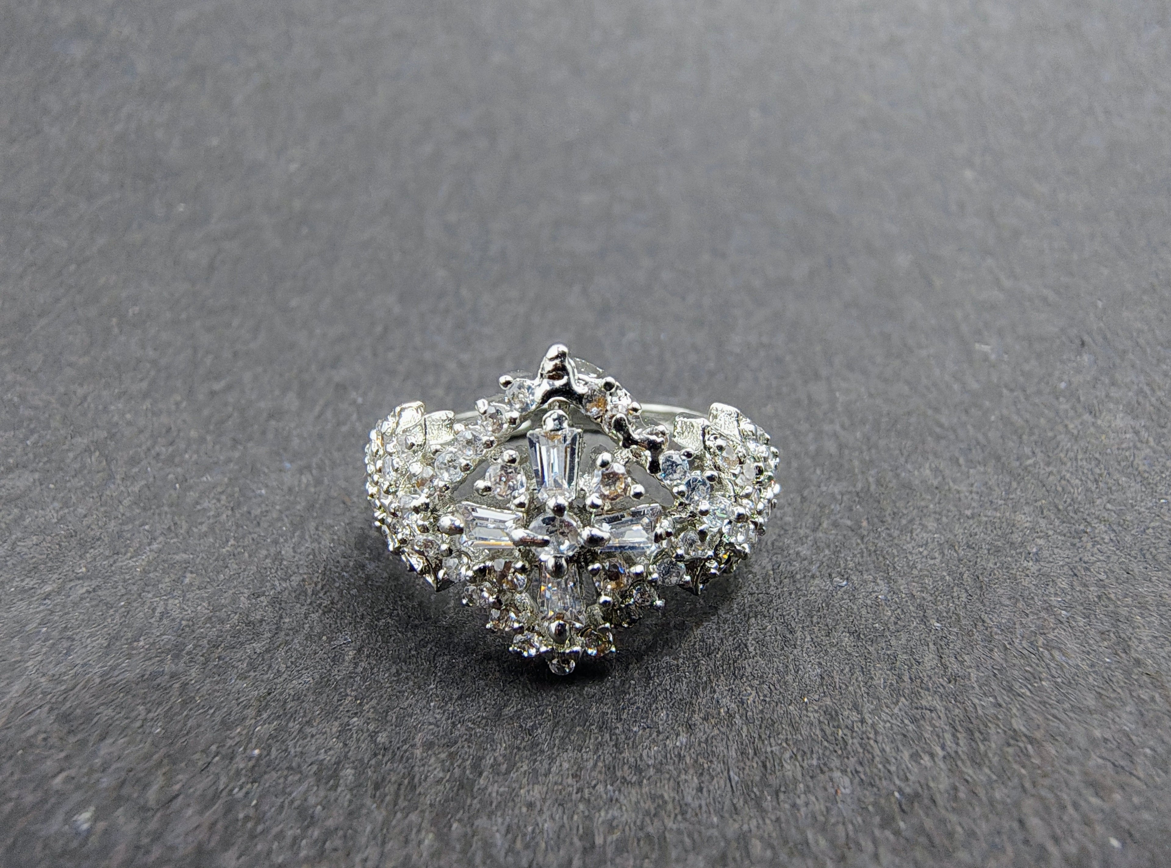 Silver snowflake ring with white stones