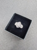 Silver snowflake ring with white stones