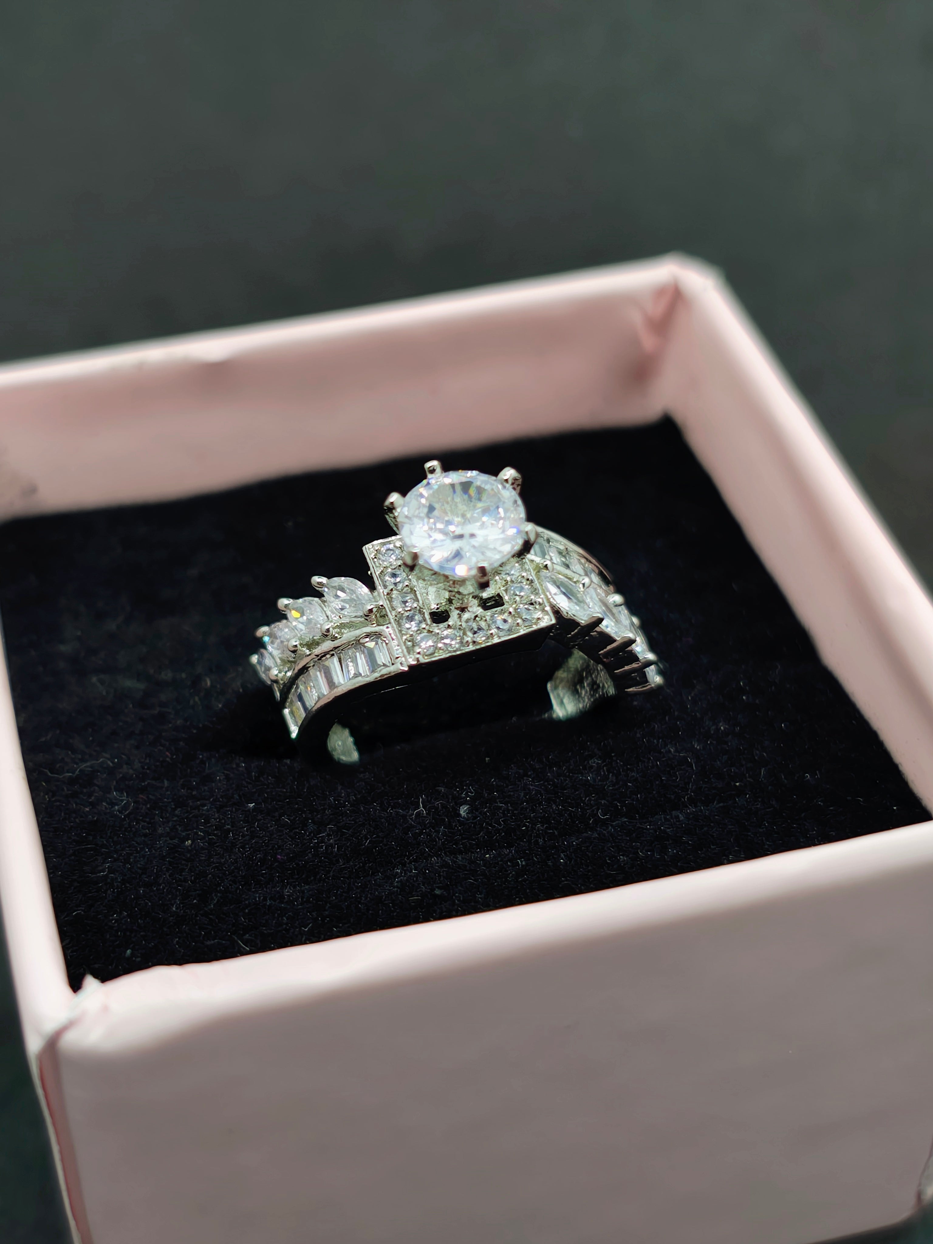 Silver and white Oval- Cut stone ring