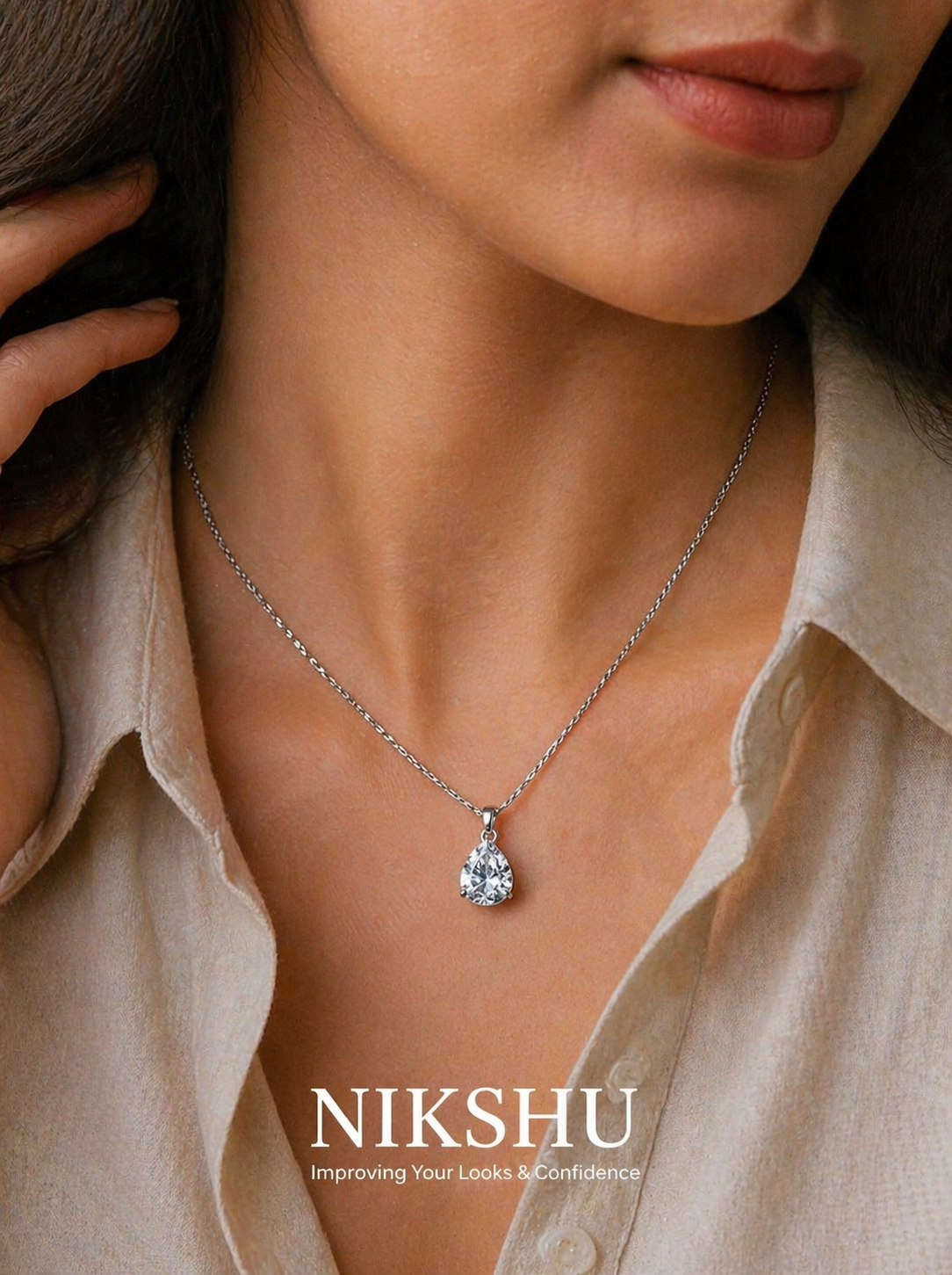 Nikshu Elegant Pear Cut Zirconia Drop Pendant
